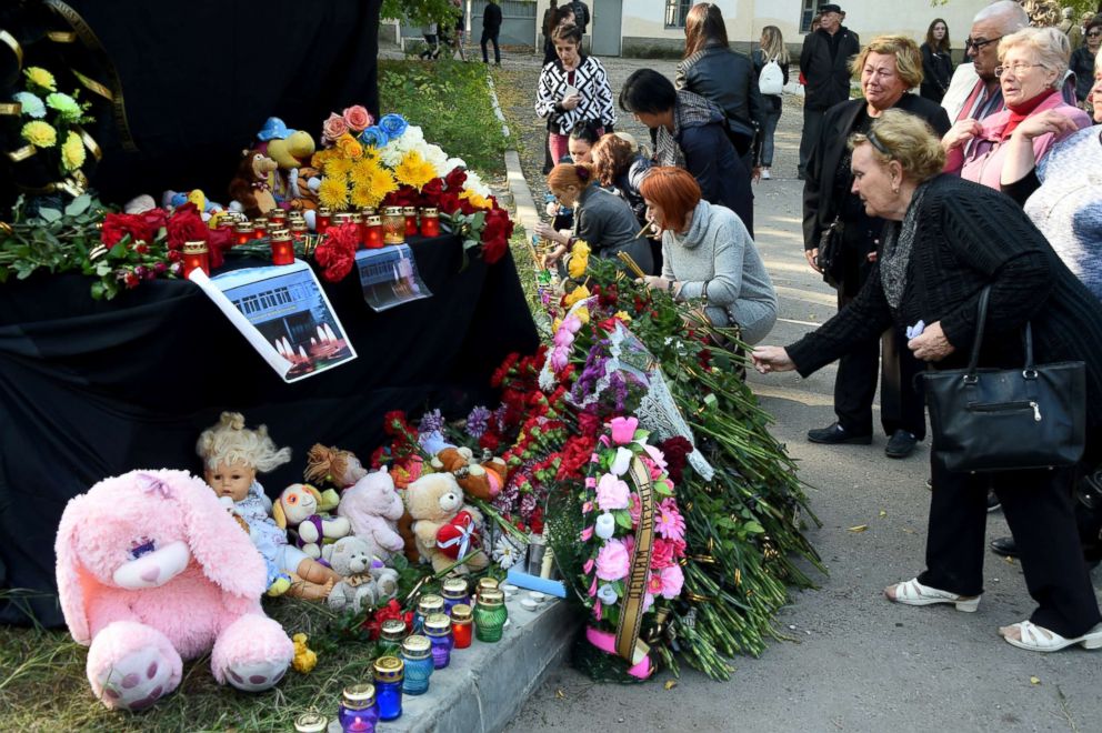 PHOTO: A prayer service is held for the people killed during an attack in the Kerch Polytechnic College, Oct. 18, 2018, in Kerch, Russia.