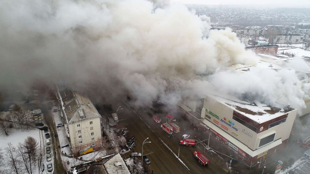 PHOTO: Smoke rises above a multi-story shopping center in the Siberian city of Kemerovo, Russia, March 25, 2018.