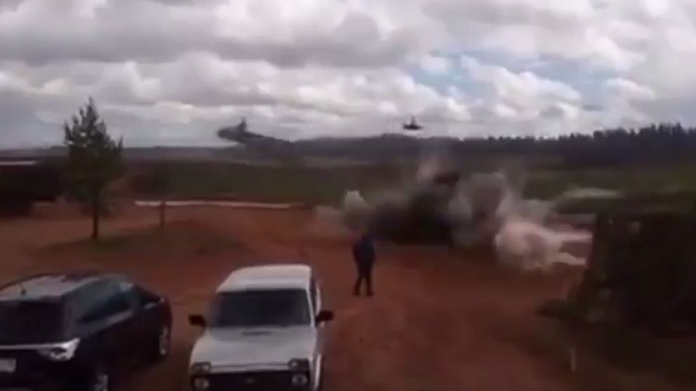 PHOTO: A screen grab taken from video posted to the internet by Russian website 66.ru seems to show a Russian attack helicopter firing on a group of bystanders in an incident that authorities confirmed happened during live fire military exercises.