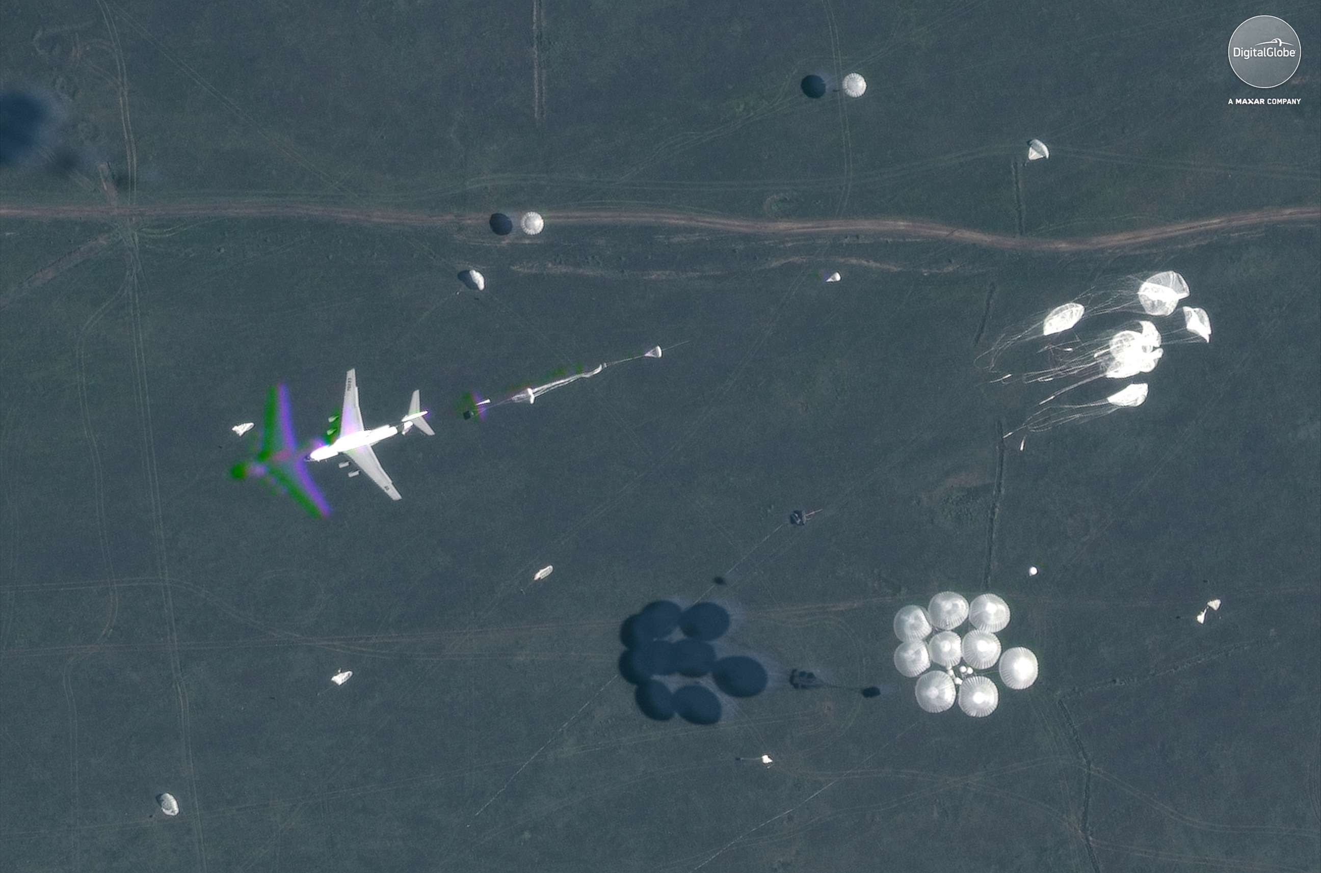 PHOTO: A satellite image shows parachutes deployed in midair during Russia's "Vostok 2018" military exercises in Tsugol, Russia, on Sep. 13, 2018.