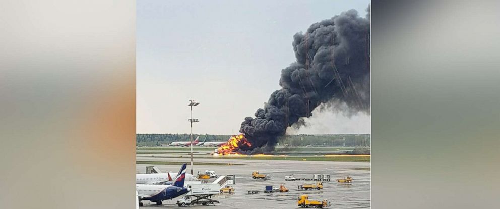 PHOTO: In this image provided by Riccardo Dalla Francesca shows smoke rises from a fire on a plane at Moscow's Sheremetyevo airport on Sunday, May 5, 2019.