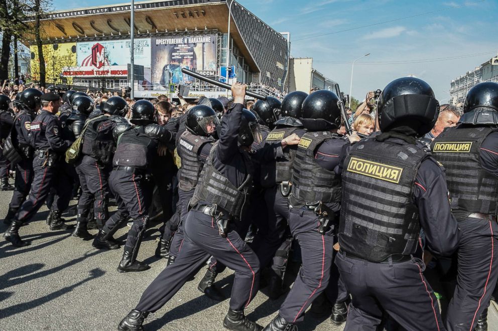 PHOTO: Russian police push protesters back during a demonstration against President Vladimir Putin in Pushkin Square in Moscow, Russia, May 5, 2018.