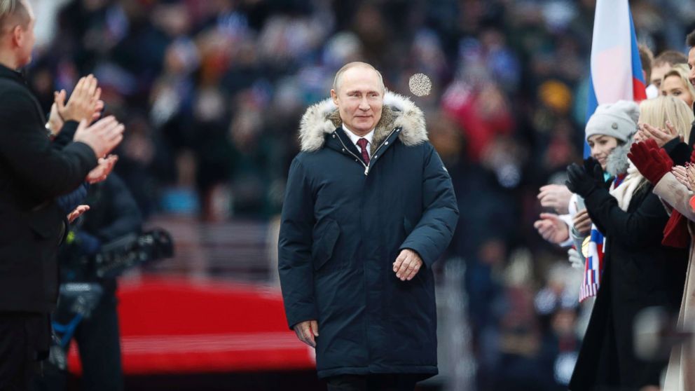 Russian President Vladimir Putin arrives to attend a massive rally in his support as a presidential candidate at the Luzhniki stadium in Moscow, Russia, March 3, 2018.