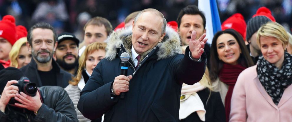 PHOTO: Russian President Vladimir Putin gives a speech during a rally in his support as a presidential candidate at the Luzhniki stadium in Moscow, March 3, 2018.