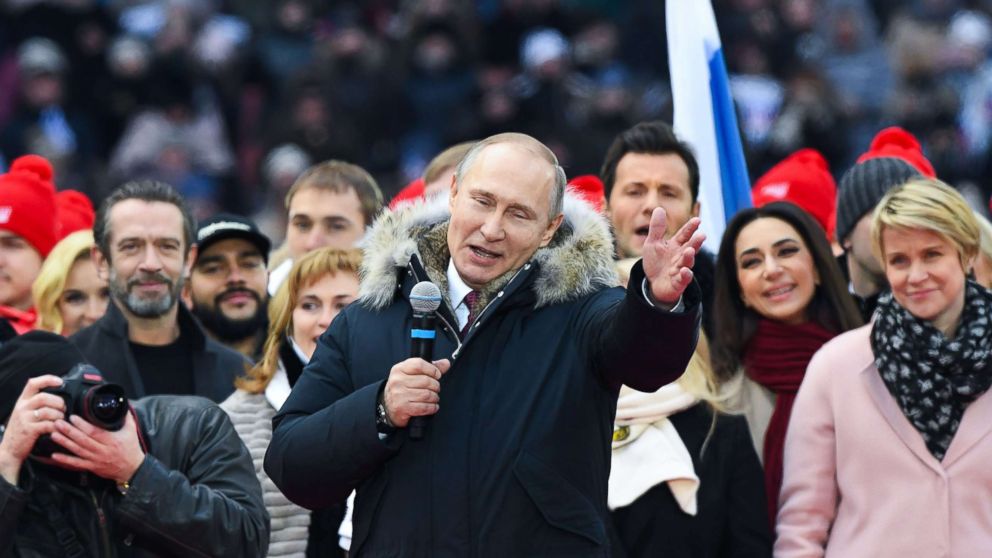 Russian President Vladimir Putin gives a speech during a rally in his support as a presidential candidate at the Luzhniki stadium in Moscow, March 3, 2018.