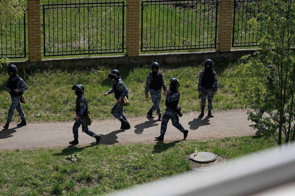 PHOTO: Tactical team responds to a deadly shooting at School Number 175 in Kazan, Tatarstan, Russia May 11, 2021 in this image obtained from social media. 