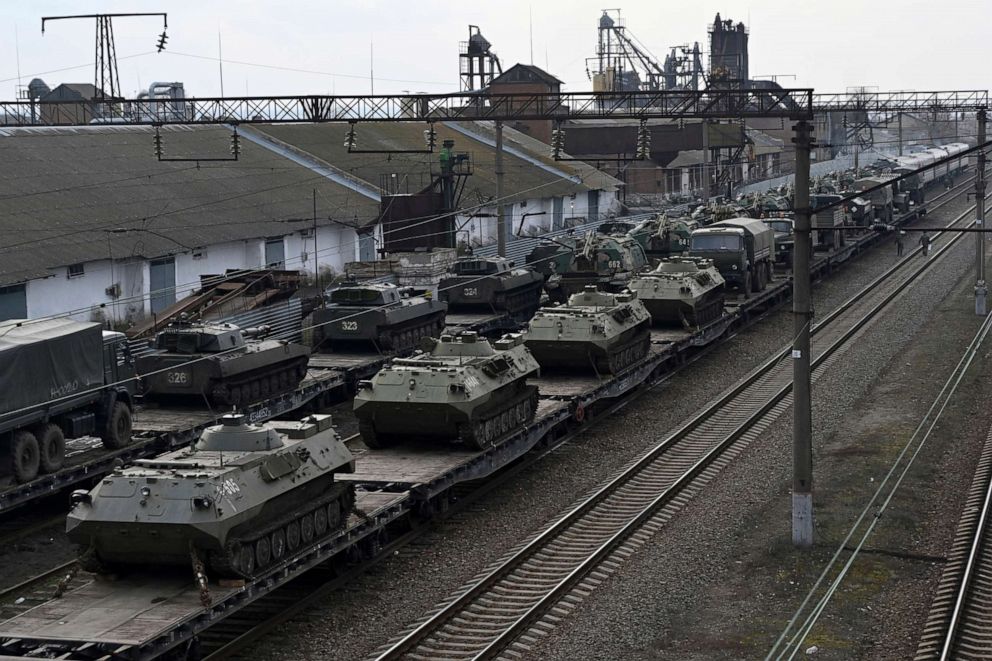 PHOTO: Russian armored vehicles are loaded onto railway platforms at a railway station in region not far from Russia-Ukraine border, in the Rostov-on-Don region, Russia, Feb. 23, 2022.