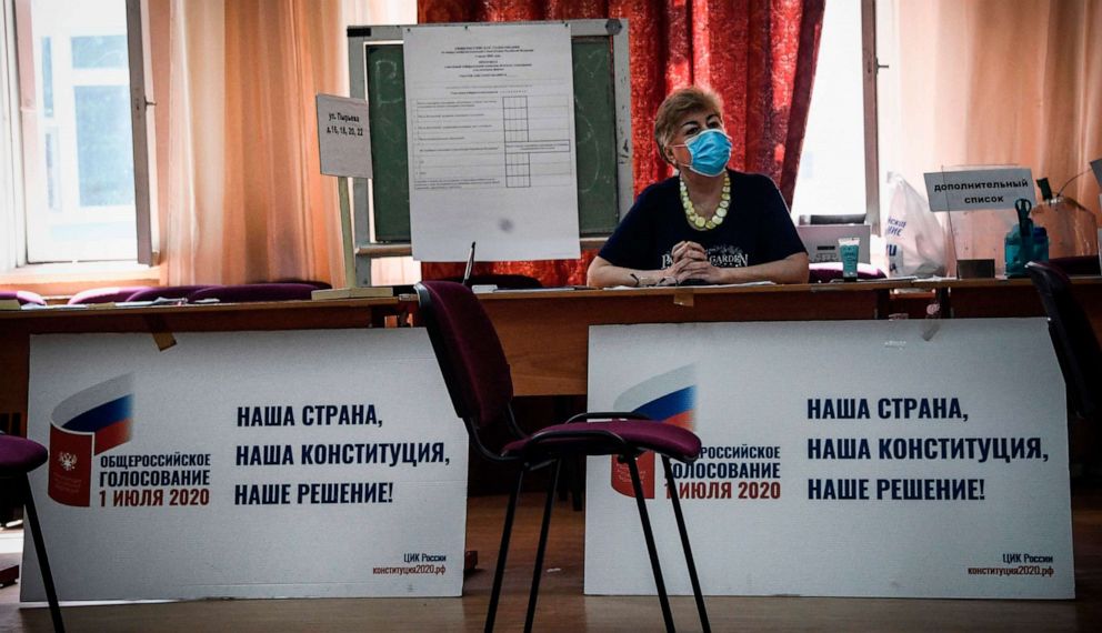 PHOTO: A member of a local electoral commission waits at a polling station in Moscow, June 29, 2020. Election officials opened polls ahead of the official July 1 vote to avoid overcrowding that could spread COVID-19.