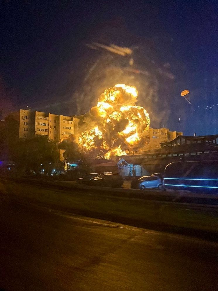 PHOTO: In this handout photo released by Kooperativ Telegram Channel, flames and smoke rise from the scene after a warplane crashed into a residential area in Yeysk, Russia, Monday, Oct. 17, 2022.