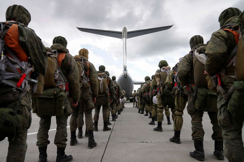 PHOTO: Russian paratroopers line up before boarding an Ilyushin Il-76 transport plane as they take part in the military exercises "Zapad-2021" staged by the armed forces of Russia and Belarus at an aerodrome in Kaliningrad Region, Russia, Sept. 13, 2021.