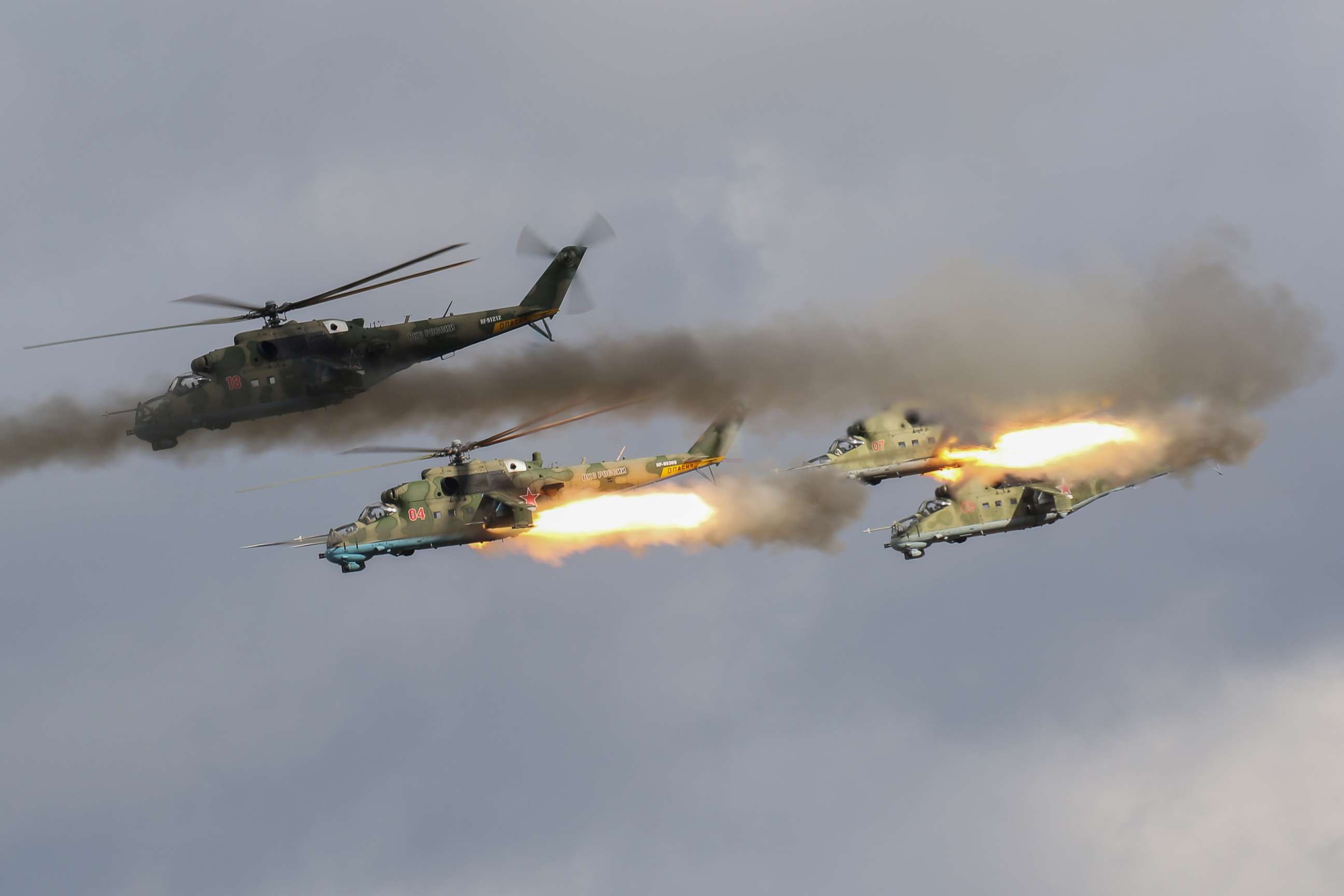 PHOTO: Russian MI-24 attack helicopters fire rockets during the active phase of the military exercises "Zapad-2021" staged by the armed forces of Russia and Belarus at the Mulino training ground in Nizhny Novgorod Region, Russia, Sept. 7, 2021.