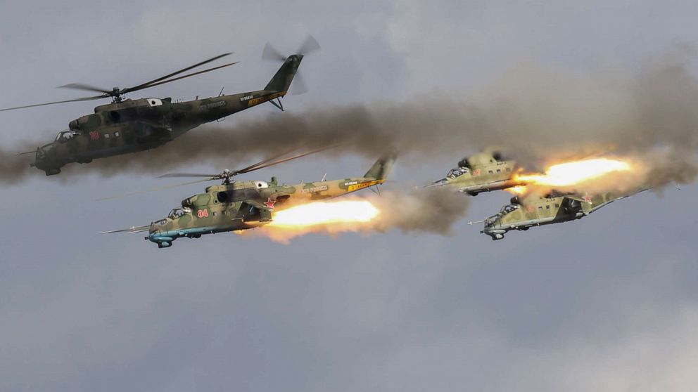 PHOTO: Russian MI-24 attack helicopters fire rockets during the active phase of the military exercises "Zapad-2021" staged by the armed forces of Russia and Belarus at the Mulino training ground in Nizhny Novgorod Region, Russia, Sept. 7, 2021.