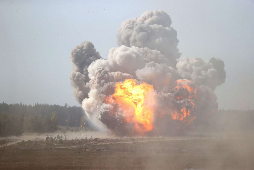 PHOTO: An explosion is seen during the military exercise Zapad-2021 staged by the the armed forces of Russia and Belarus at the Obuz-Lesnovsky training ground, Belarus Sept. 12, 2021