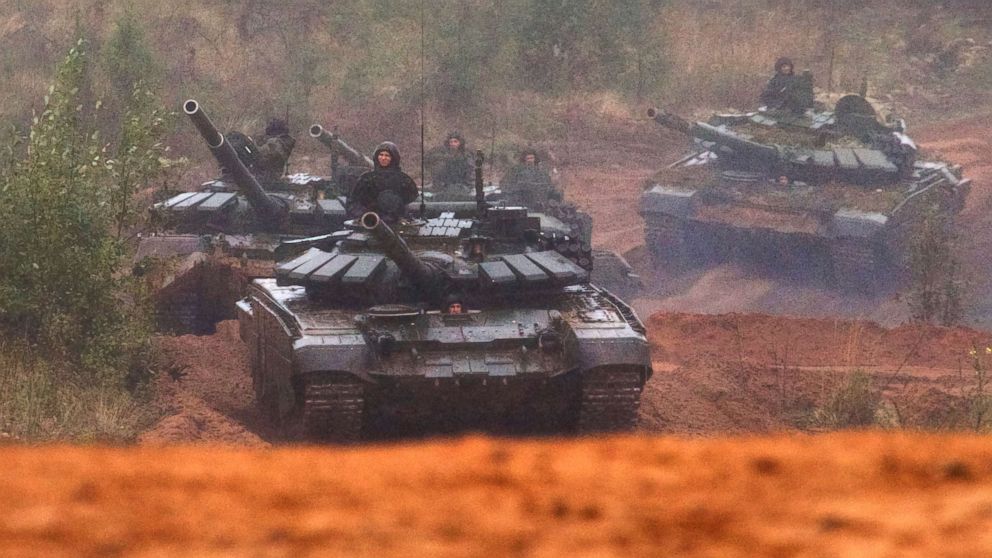 Russian tanks advance during a military exercise at a training ground at the Luzhsky Range, near St. Petersburg, Russia, Sept. 18, 2017. The Zapad (West) 2017 maneuvers have caused concern among some NATO members neighboring Russia, who have criticized a lack of transparency about the exercises and questioned Moscow's real intentions.