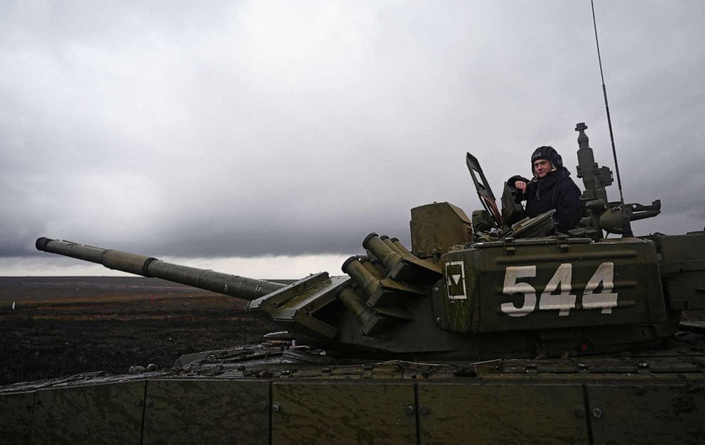 PHOTO: A Russian service member is seen atop of a T-72B3 main battle tank during military drills at the Kadamovsky range in the Rostov region, Russia, Dec. 20, 2021.