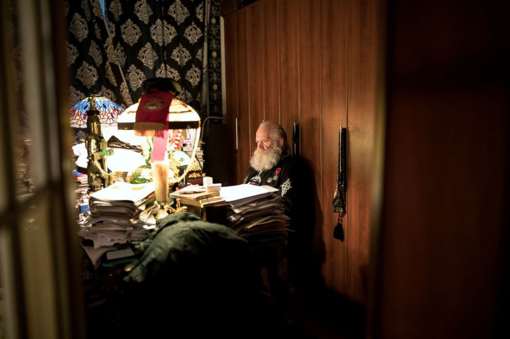 PHOTO: Leonid Simonovich-Nikshich, the head of Orthodox Banner Bearers, works on an article in his office at his home in Moscow, July 19, 2018.