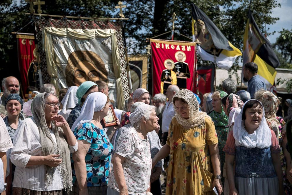 PHOTO: Local churchgoers attend a procession organised by the Union of Orthodox Banner-Bearers to commemorate 100 years since the killing of Tsar Nicholas II, in Spaso-Andronikov Monastery in Moscow, July 17, 2018.