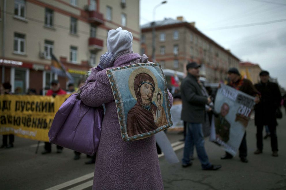 PHOTO: A woman with an image of Virgin Mary on her back attends a march of the Unity of Nation in Oktyabrskoye Polye in Moscow, Russia, Nov. 4, 2017.