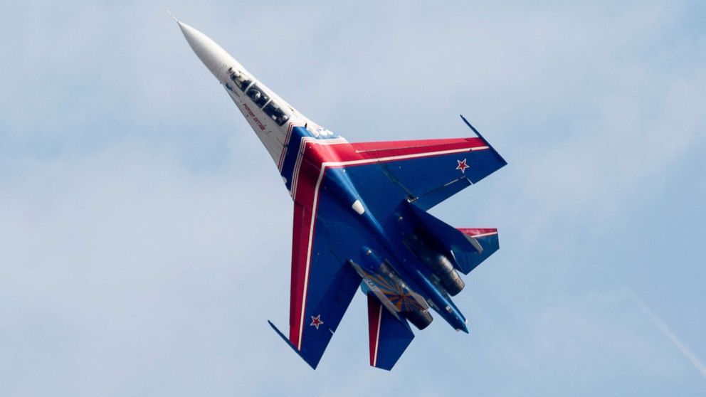 A Russian Air Force Knights SU-27 jet flies during an aerobatics display in Zhuhai, China, Nov. 12, 2014.