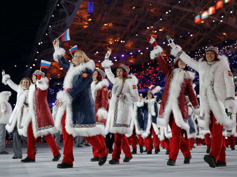 PHOTO: Members of the Russian team cheer as they enter the stadium during the opening ceremony of the 2014 Winter Olympics in Sochi, Russia, Feb. 7, 2014.