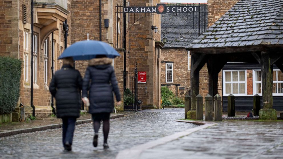 PHOTO: People walk through the centre of the town of Oakham, as local officials consider plans to build a McDonald's drive-thru burger outlet, in Oakham, England, Jan. 14, 2020.