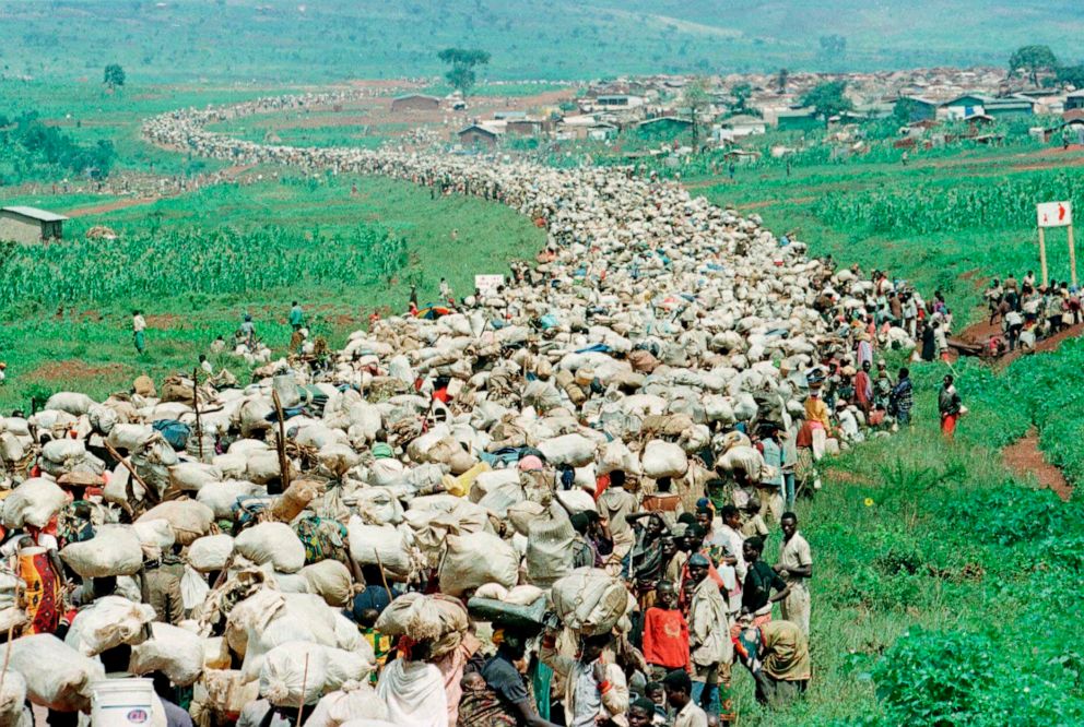 PHOTO: Tens of thousands of Rwandan refugees, who have been forced by Tanzanian authorities to go back to their country despite fears they will be killed upon their return, head back toward the Rwandan border on a road in Tanzania on Dec. 19, 1996.