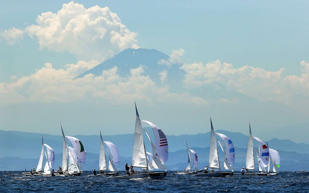 PHOTO: Nikole Barnes and Lara Dallman-Weiss of Team USA (center) sail their 470 class dinghy during a practice race ahead of the Tokyo 2020 Olympic Games on July 21, 2021 in Tokyo, Japan.