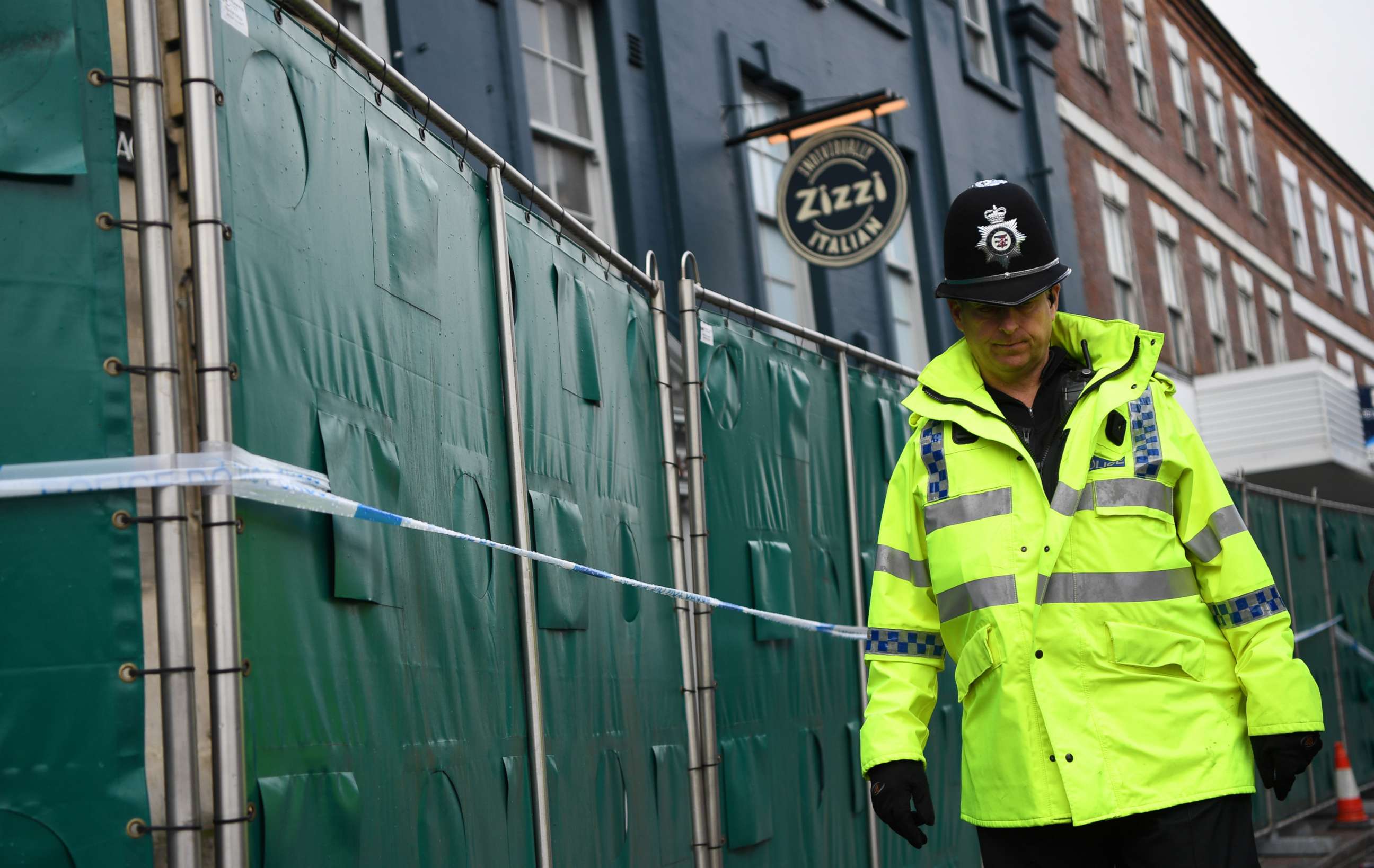 PHOTO: A police officer passes a cordoned-off Zizzi restaurant in Salisbury, Britain, March 12, 2017. Russian ex-spy Sergei Skripal and his daughter were attacked with a nerve agent on March 4, 2018. 