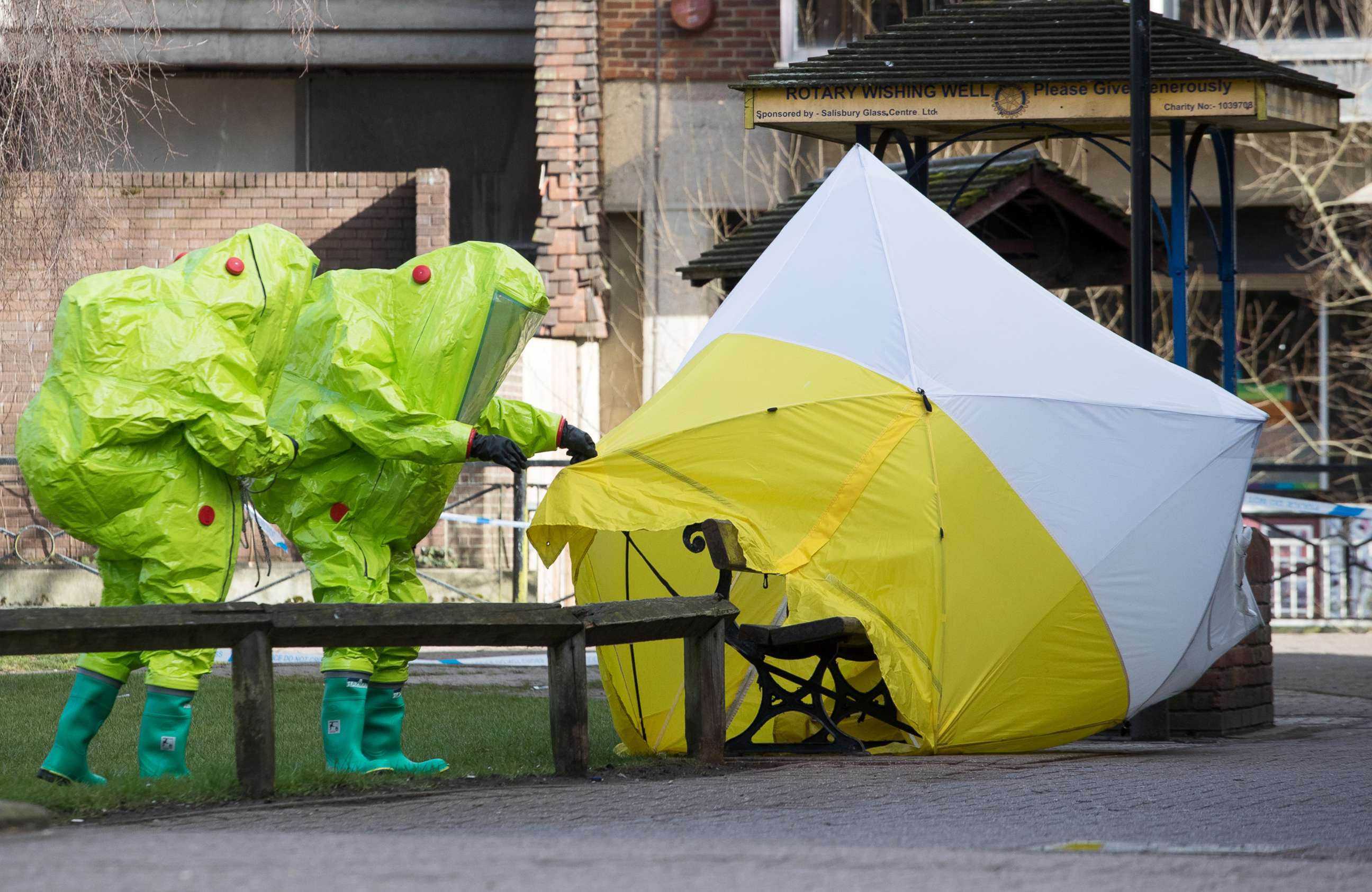 PHOTO: Specialists in protective suits secure the forensic tent on March 8, 2018, that had been blown over by the wind and is covering the bench where Sergei Skripal was found with his daughter after an apparent nerve agent attack, in Salisbury, England.