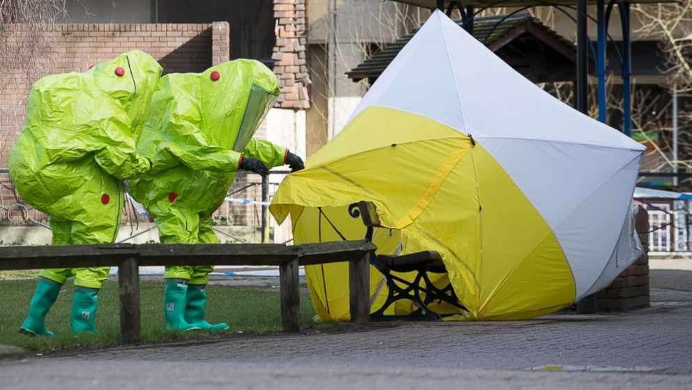 PHOTO: Specialists in protective suits secure the forensic tent on March 8, 2018, that had been blown over by the wind and is covering the bench where Sergei Skripal was found with his daughter after an apparent nerve agent attack, in Salisbury, England.