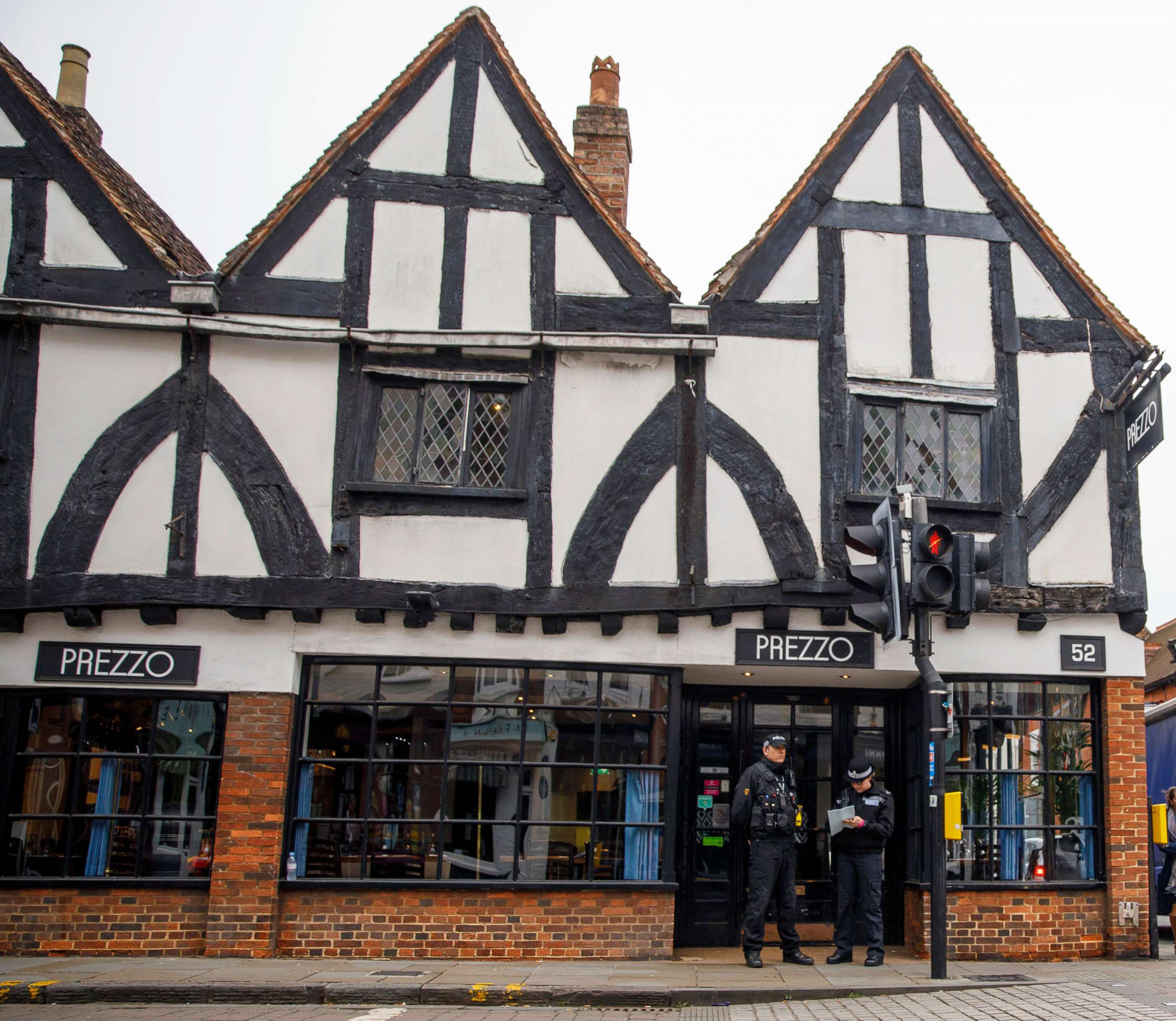 PHOTO: Police gather outside Prezzo restaurant which has been closed after two people became ill earlier this evening, Sept. 17, 2018 in Salisbury, England.