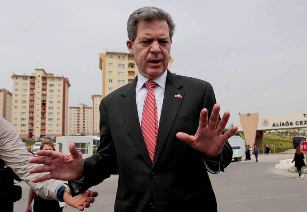 PHOTO: U.S. envoy for religious freedom Sam Brownback talks to media outside the Aliaga Prison and Courthouse complex in Izmir, Turkey April 16, 2018. 