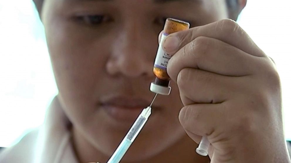 PHOTO: A New Zealand health official prepares a measles vaccination at a clinic in Apia, Samoa, Nov. 25, 2019.