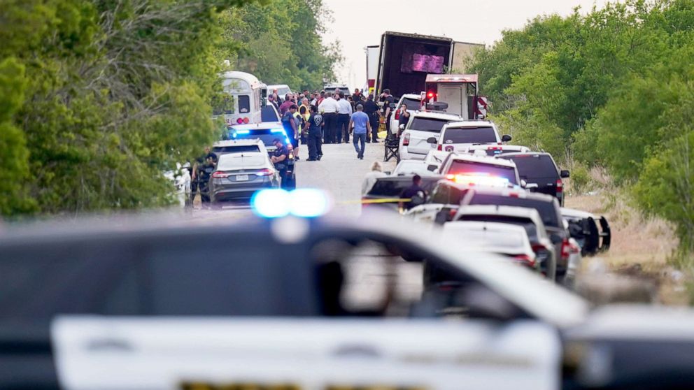 PHOTO: Police block the scene where a tractor trailer with multiple dead bodies was discovered in San Antonio, Texas June 27, 2022.