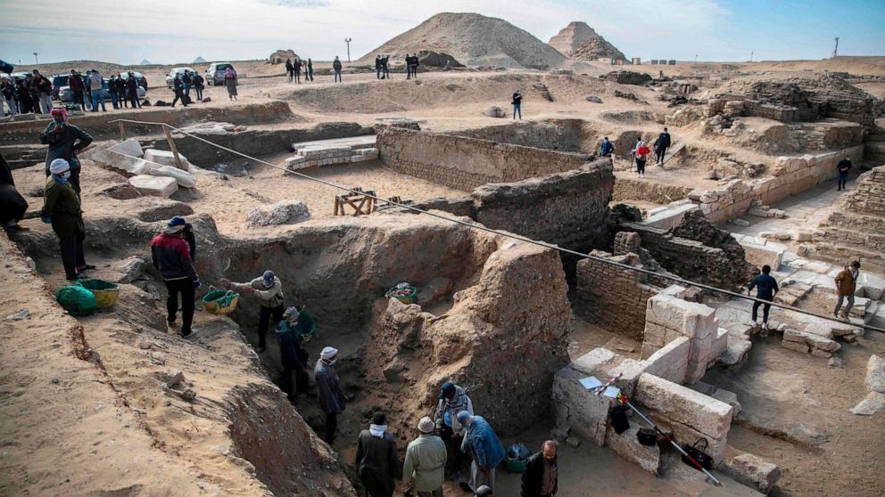 PHOTO: Workers excavate a site during the official announcement of the discovery by an Egyptian archaeological mission of a new trove of treasures at Egypt's Saqqara necropolis south of Cairo, Egypt, Jan. 17, 2021.