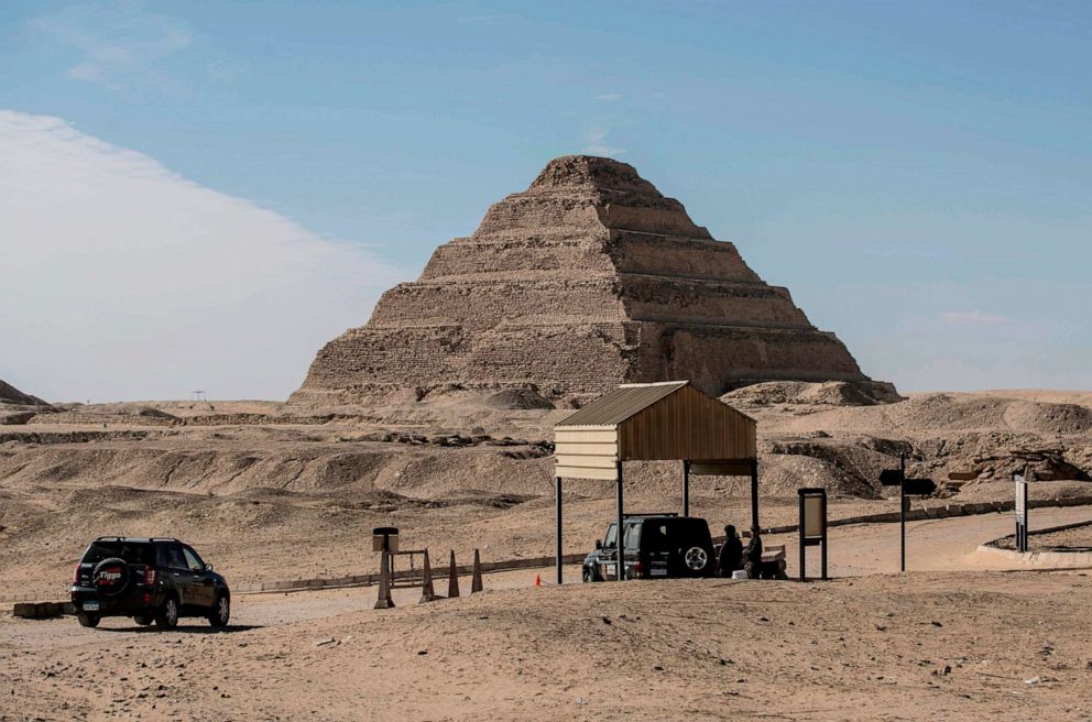 PHOTO: Egyptian security officers man their station across from the step pyramid of Djoser at the Saqqara necropolis south of Cairo, Egypt, Jan. 17, 2021.