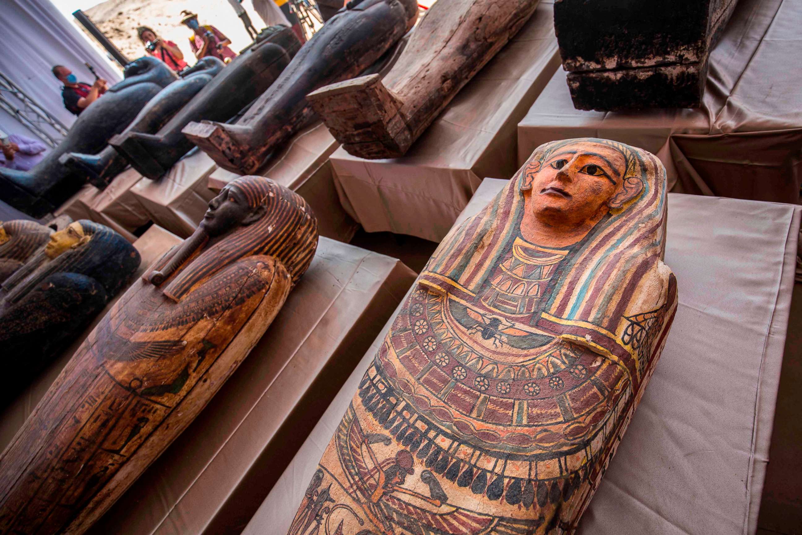 PHOTO: Sarcophagi, excavated by the Egyptian archaeological mission, are displayed during a press conference, Oct. 3, 2020, at the Saqqara necropolis, 30 kms south of the Egyptian capital Cairo.