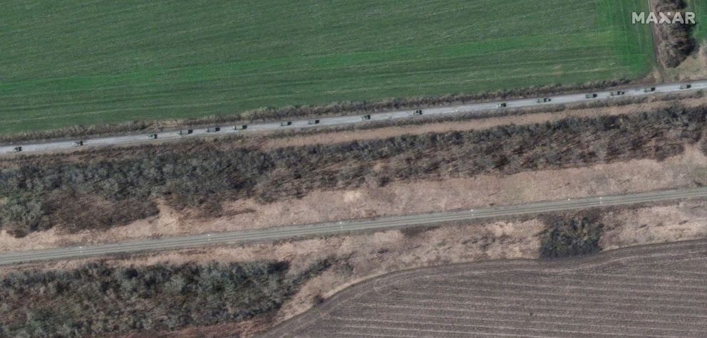 PHOTO: A satellite image shows armored vehicles and trucks at the southern end of a military convoy moving south through the town of Velykyi Burluk, east of Kharkiv, Ukraine, on April 8, 2022.