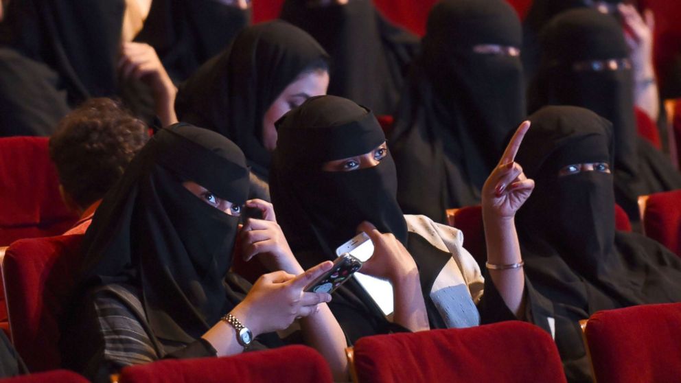 Saudis attend a film festival, Oct. 20, 2017, at the King Fahad Culture Center in Riyadh, Saudi Arabia. A decades-long ban on cinemas is to be lifted next year. 