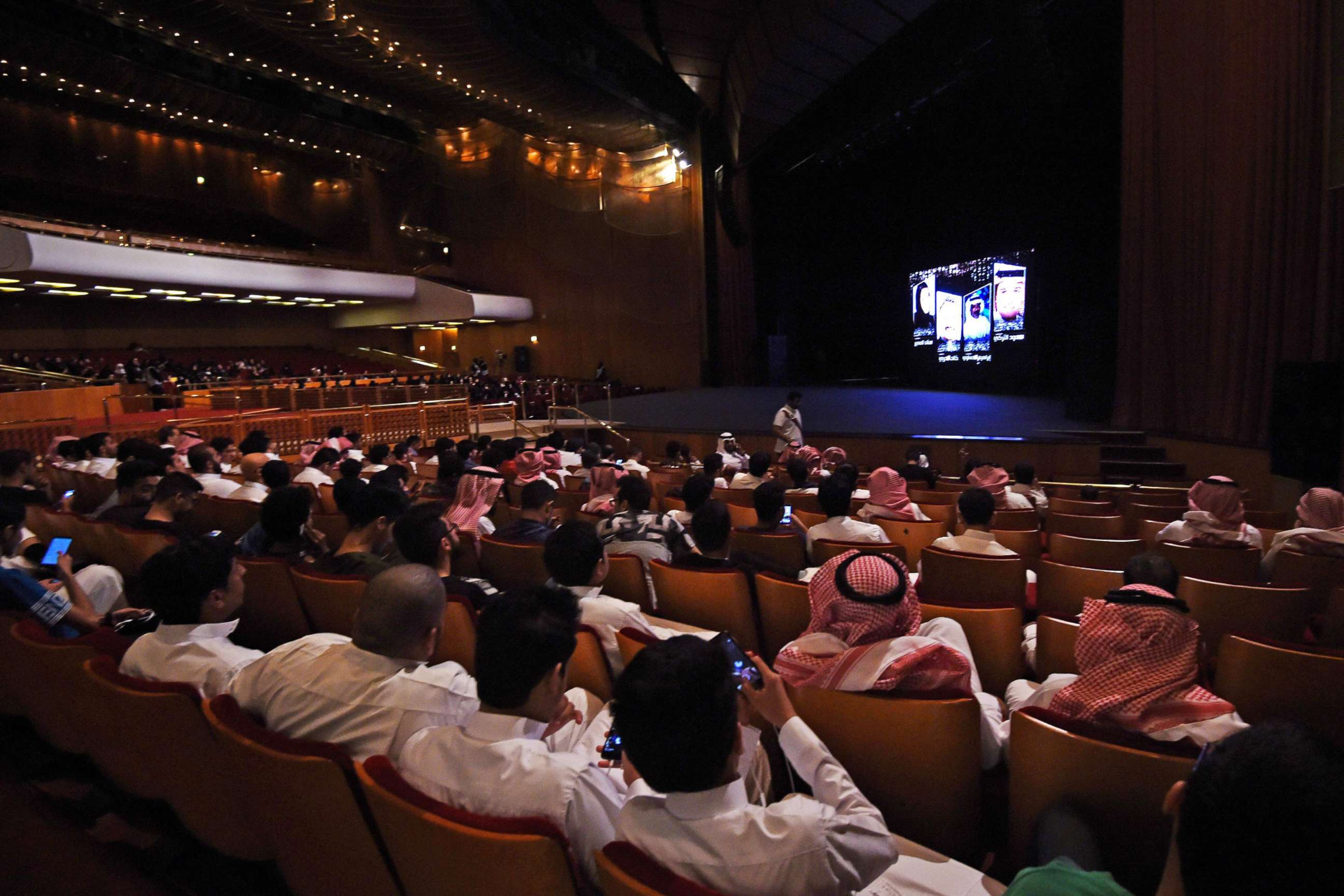 PHOTO: Saudis attend a film festival, Oct. 20, 2017, at the King Fahad Culture Center in Riyadh, Saudi Arabia. A decades-long ban on cinemas is to be lifted next year. 