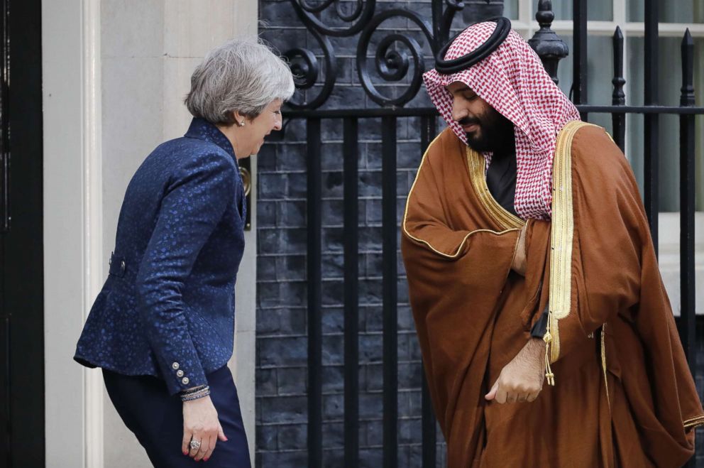 PHOTO: Britain's Prime Minister Theresa May (L) greets Saudi Arabia's Crown Prince Mohammed bin Salman (R) outside 10 Downing Street, in London, March 7, 2018.