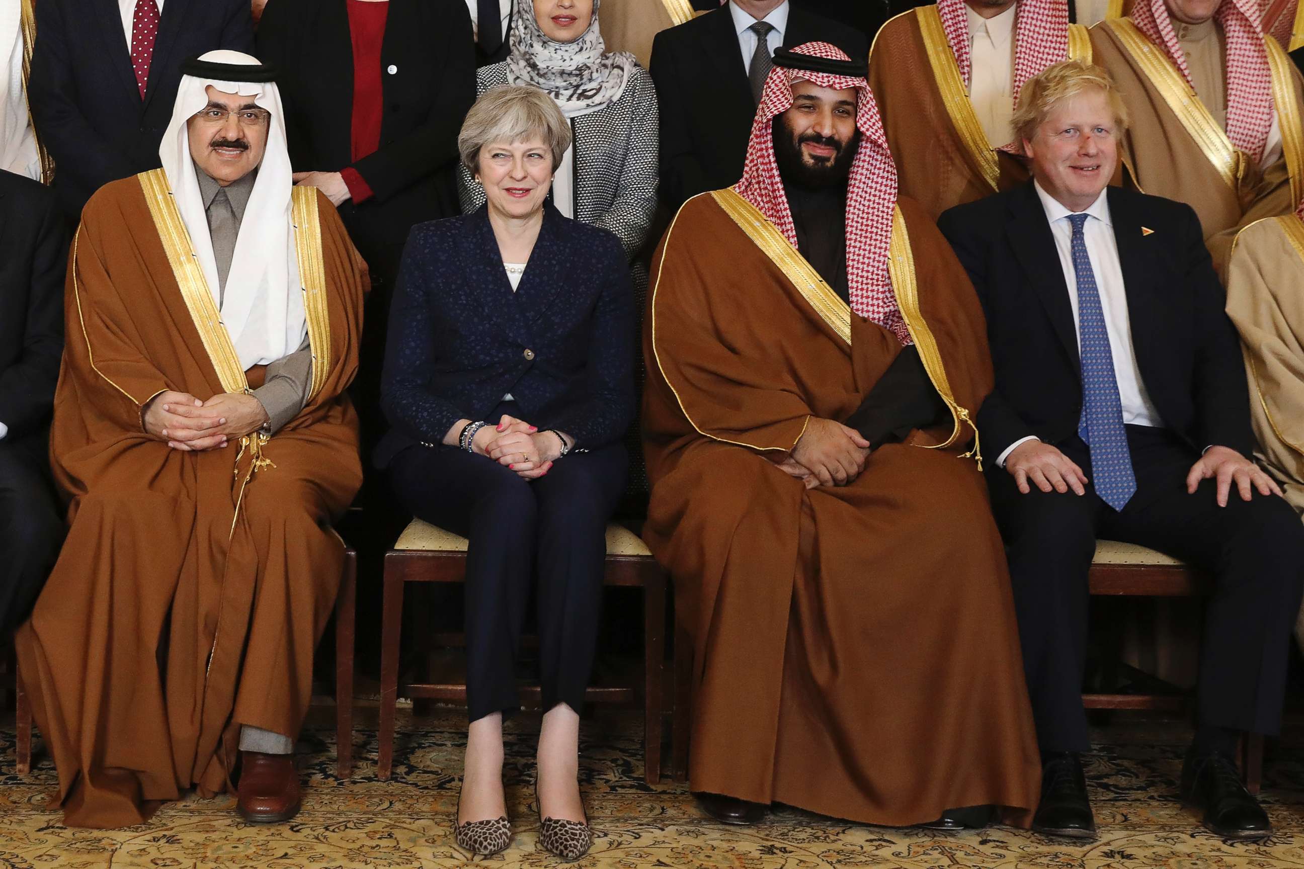 PHOTO: Britain's Prime Minister Theresa May, 2nd left, sits with Saudi Crown Prince Mohammed bin Salman, 2nd right, and other members of the British government and Saudi ministers and delegates inside 10 Downing Street in London, March 7, 2018.