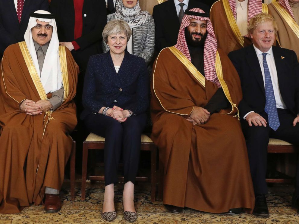 PHOTO: Britains Prime Minister Theresa May, 2nd left, sits with Saudi Crown Prince Mohammed bin Salman, 2nd right, and other members of the British government and Saudi ministers and delegates inside 10 Downing Street in London, March 7, 2018.