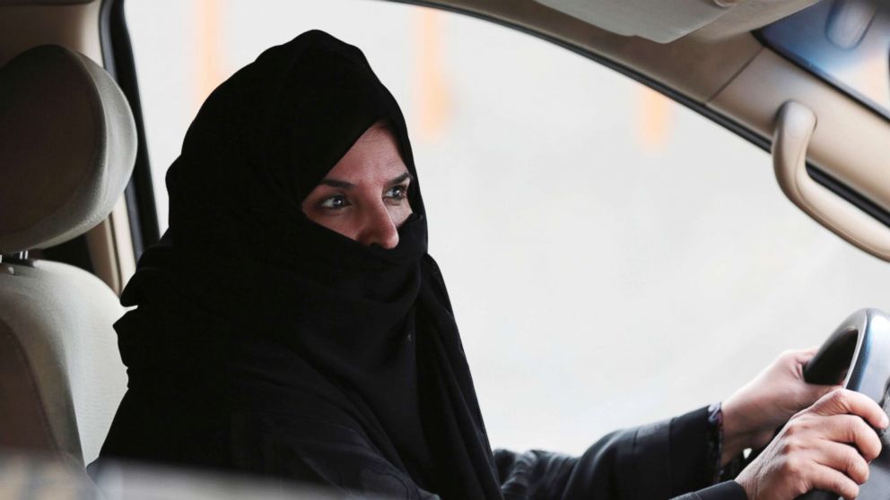 A woman drives a car on a highway in Riyadh, Saudi Arabia,  March 29, 2014. as part of a campaign to defy Saudi Arabia's ban on women driving.