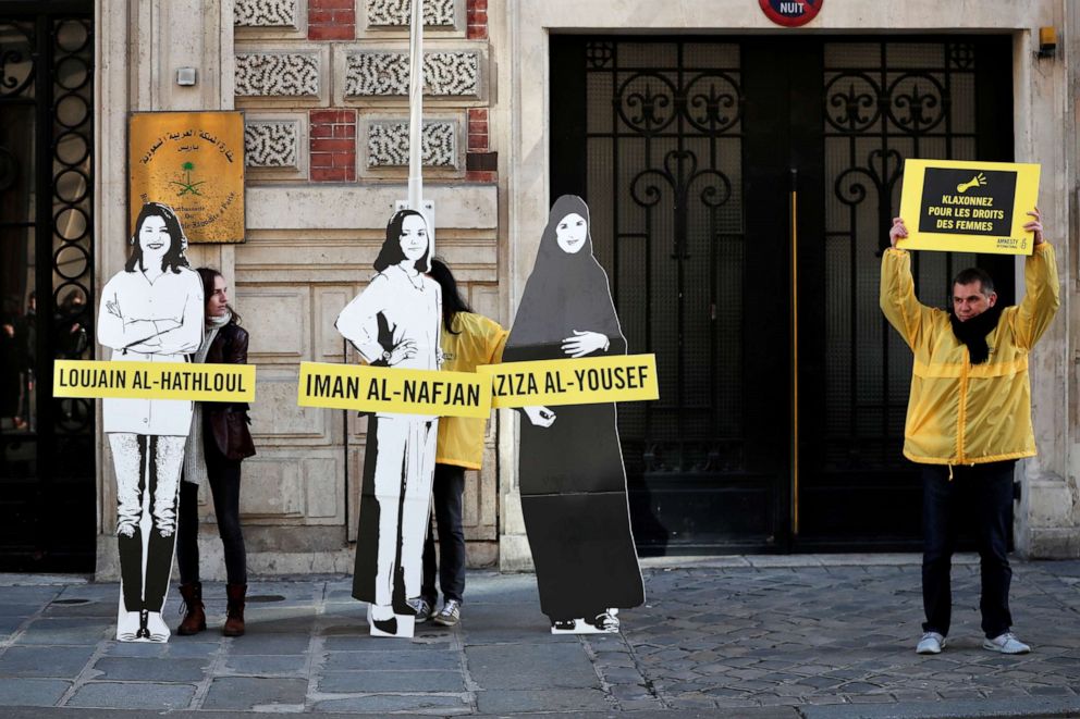 PHOTO: Demonstrators stage the protest on International Women's Day to urge Saudi authorities to release jailed women's rights activists Loujain al-Hathloul, Eman al-Nafjan and Aziza al-Yousef outside the Saudi Arabian Embassy in Paris, March 8, 2019. 