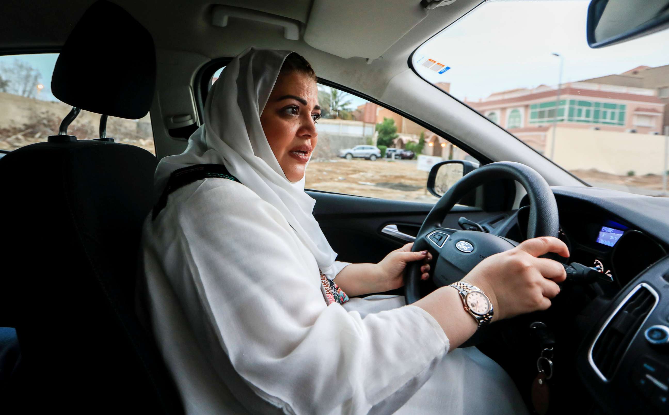 PHOTO: Dr Samira al-Ghamdi, 47, a practicing psychologist, drives around the side roads of a neighborhood as she prepares to hit the road on Sunday as a licensed driver, in Jeddah, Saudi Arabia June 21, 2018.