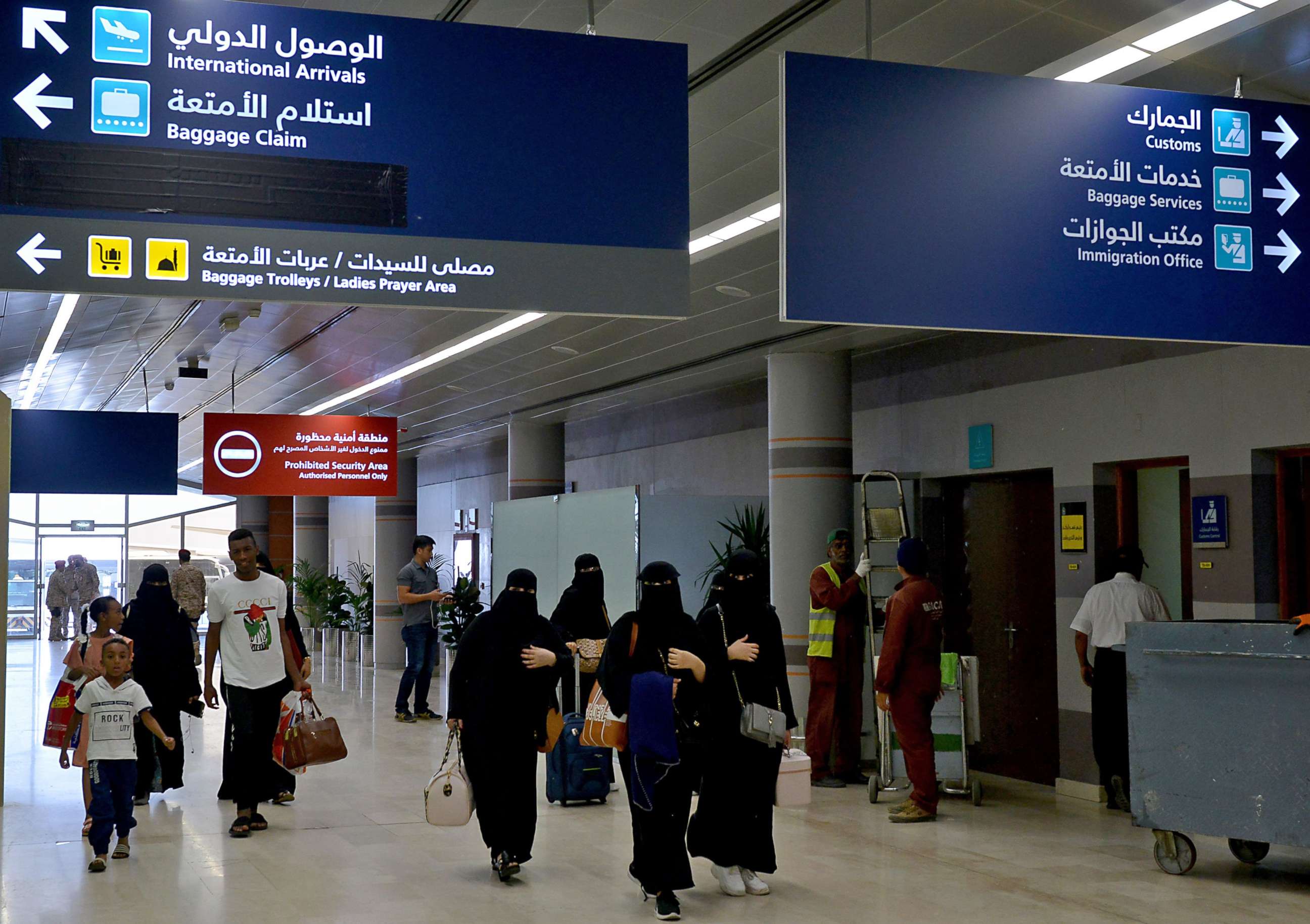 PHOTO: In this file photo taken on June 13, 2019, Saudi women are shown arriving at Abha airport in the popular mountain resort of the same name in the southwest of Saudi Arabia. 