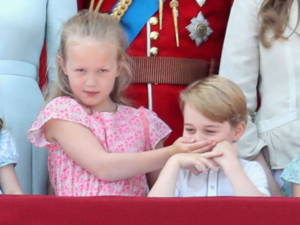 PHOTO: Savannah Phillips and Prince George of Cambridge watch the flypast on the balcony of Buckingham Palace during Trooping The Color on June 9, 2018 in London.