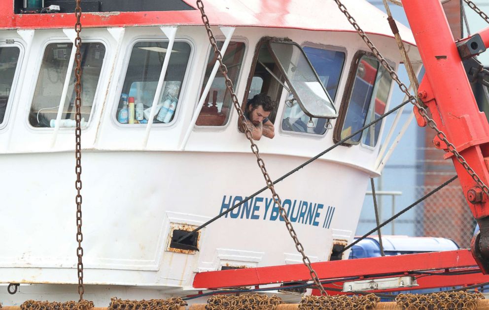 PHOTO: A member of the crew looks out of the window of the Honeybourne 3, a Scottish scallop dredger, in dock at Shoreham, south England, Aug. 29, 2018, following clashes with French fishermen early on Tuesday morning off France's northern coast.