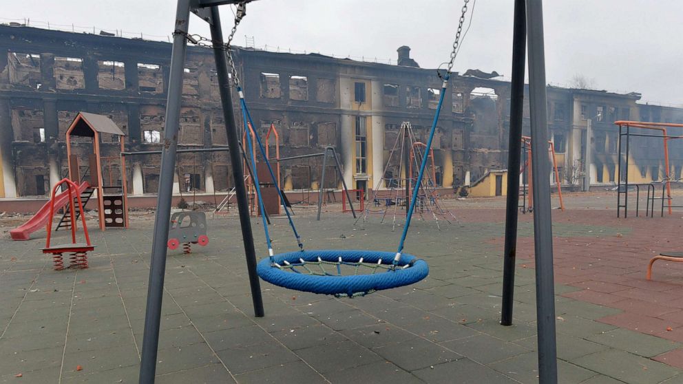 PHOTO: A playground stands outside a school destroyed during fighting not far from the center of Ukrainian city of Kharkiv, near the Ukrainian-Russian border, Feb. 28, 2022.